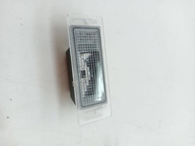 Lanterna da luz de fundo de matrícula traseira 13502178 OPEL