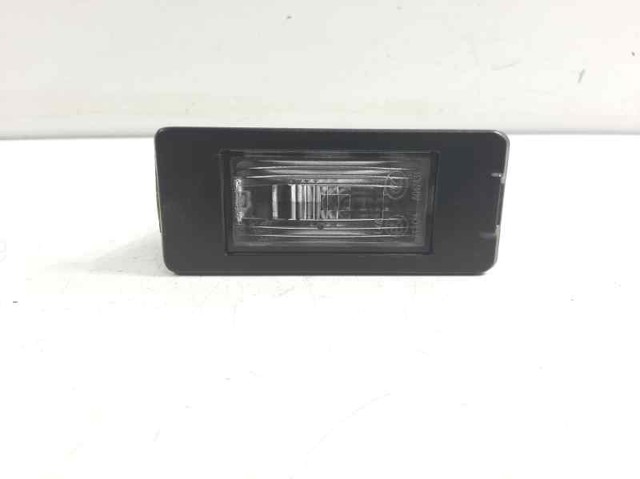 Lanterna da luz de fundo de matrícula traseira 13590043 OPEL