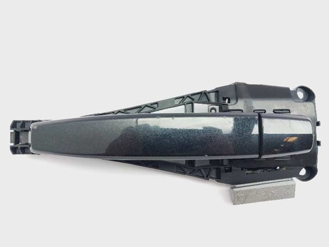 Suporte de maçaneta externa da porta dianteira direita 138174 OPEL