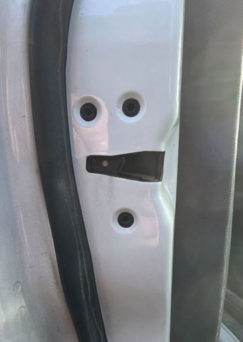 Fecho da porta dianteira esquerda 1523324 FORD
