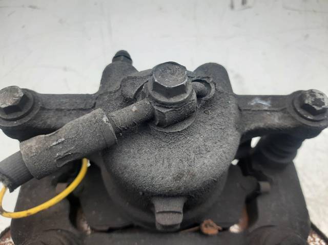 Suporte do freio dianteiro esquerdo 1766840 FORD