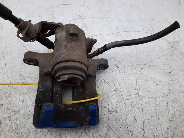 Suporte do freio traseiro esquerdo 1J0615423 VAG