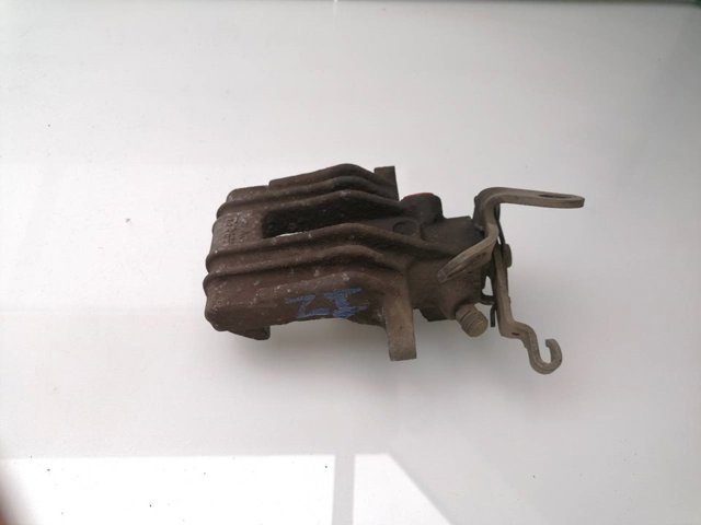 Suporte do freio traseiro esquerdo 1K0615423E VAG
