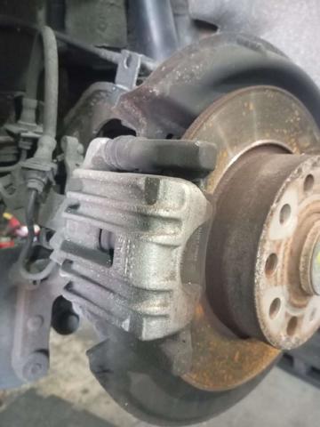 Suporte do freio traseiro esquerdo 1K0615423G VAG