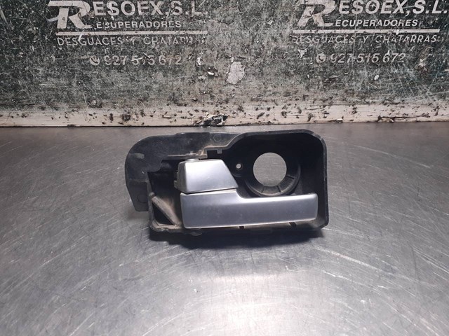 Maçaneta interna dianteira/traseira da porta esquerda 1S71F22601AF FORD