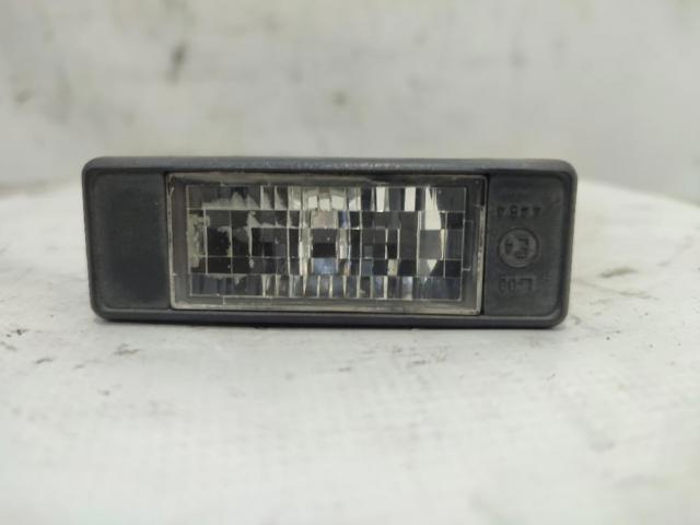 Lanterna da luz de fundo de matrícula traseira 25300100 NISSAN