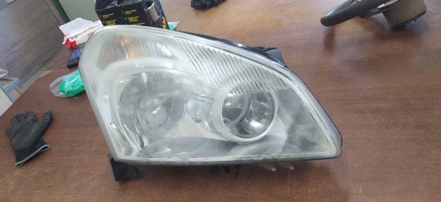 Luz direita 26010JD91B NISSAN