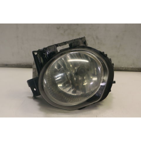 Luz esquerda 260601KA0B NISSAN