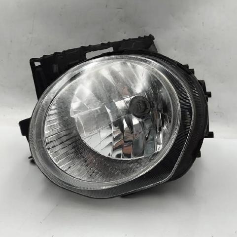 Luz esquerda 260601KA0C NISSAN