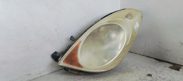 Luz esquerda 260609U10A NISSAN
