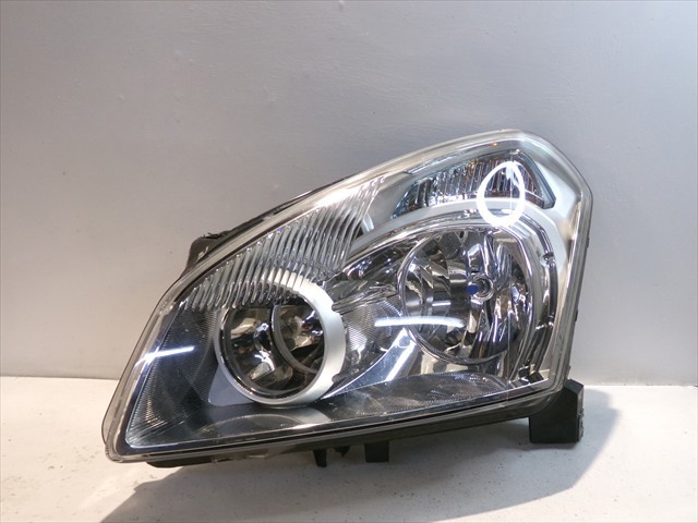 Luz esquerda 26060JD90B NISSAN