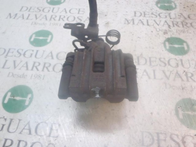 Suporte do freio traseiro esquerdo 2K0615423C VAG