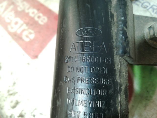 Amortecedor dianteiro esquerdo 2T1418K001CJ FORD