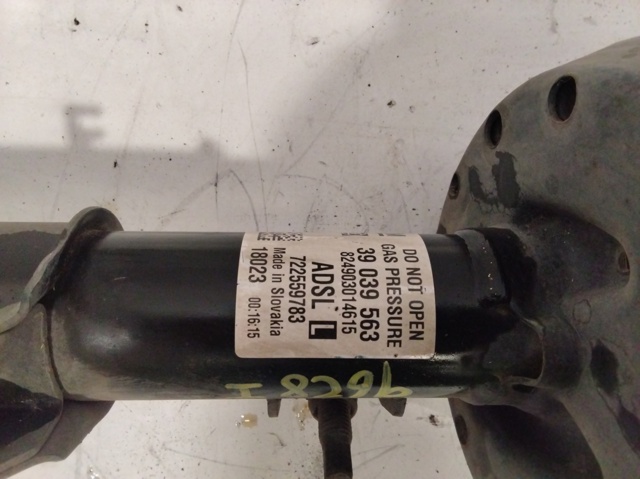 Amortecedor dianteiro esquerdo 39039563 OPEL