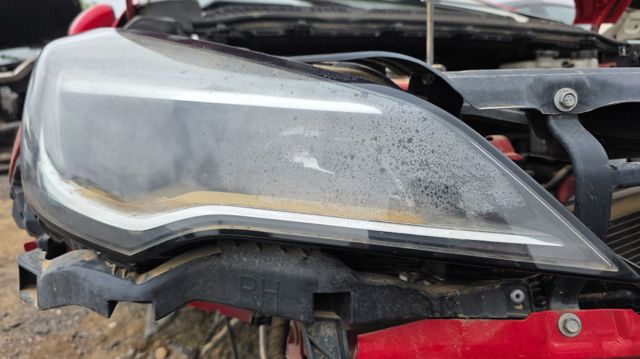 Luz direita 39081893 OPEL