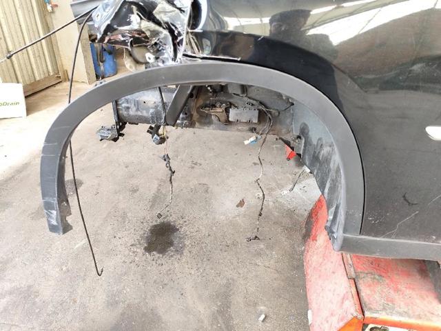 Expansor (placa sobreposta) de arco do pára-lama dianteiro esquerdo 51772990165 BMW