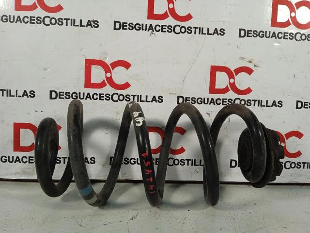 Mola traseira 55020JD04A NISSAN