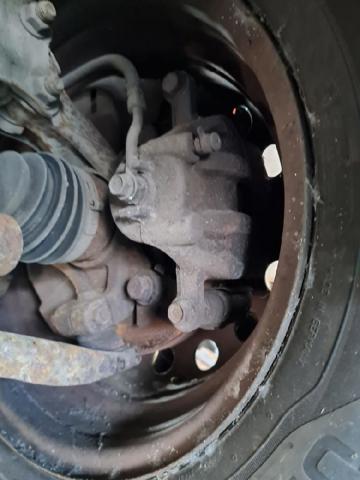 Suporte do freio dianteiro esquerdo 581101W050 HYUNDAI