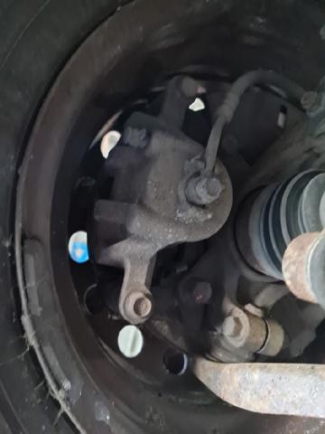 Suporte do freio dianteiro direito 581301W050 HYUNDAI