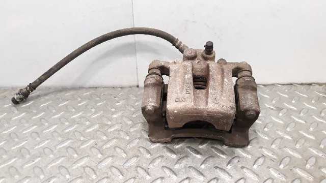 Suporte do freio traseiro direito 582302Y300 HYUNDAI