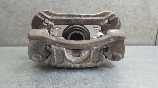 Suporte do freio traseiro esquerdo 583101HA00 HYUNDAI