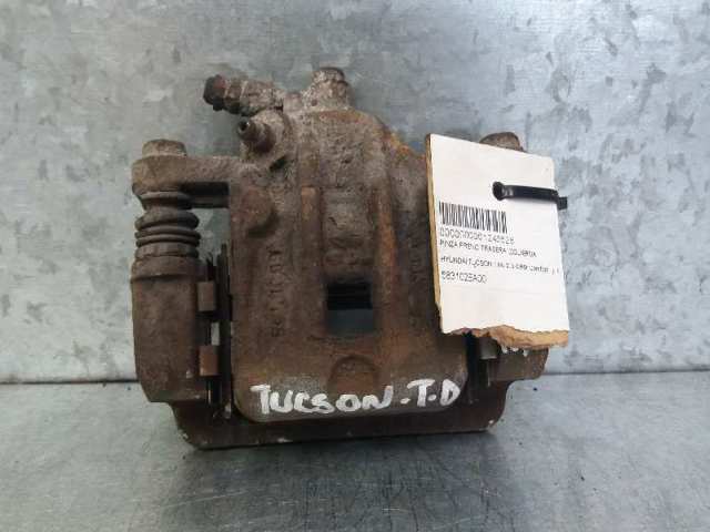 Suporte do freio traseiro esquerdo 583102EA00 HYUNDAI