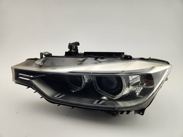 Luz esquerda 63117259525 BMW
