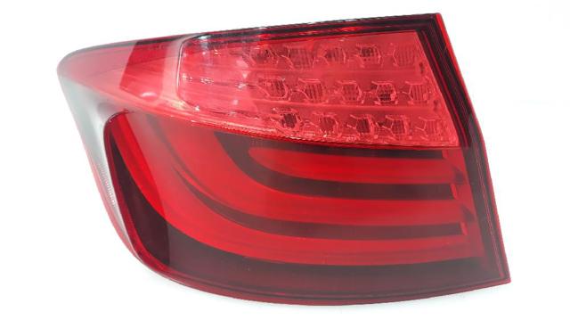 Lanterna traseira esquerda externa 63217203229 BMW