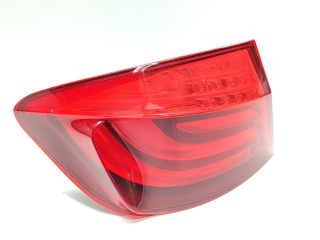 Lanterna traseira esquerda externa 63217203229 BMW