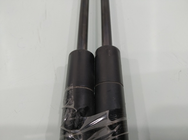 Amortecedor de tampa de porta-malas (de 3ª/5ª porta traseira) 689500W430 TOYOTA
