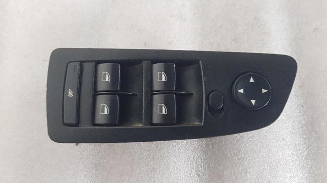 Unidade de botões dianteira esquerda de controlo de elevador de vidro 6970206 BMW