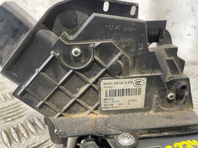 Fecho da porta dianteira esquerda 6M2AR21813EB FORD