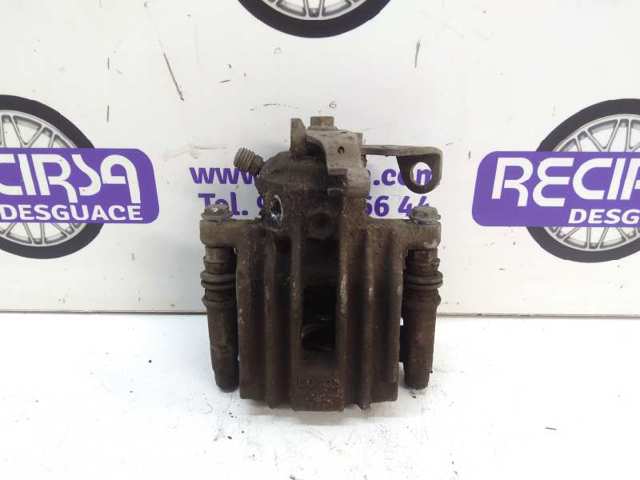 Suporte do freio traseiro esquerdo 6R0615423 VAG