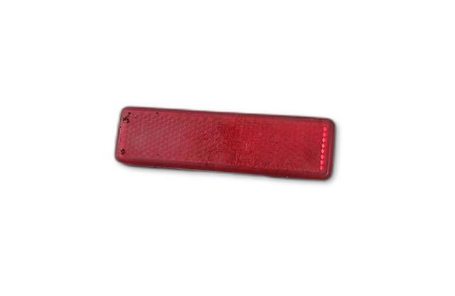 Retrorrefletor (refletor) do pára-choque traseiro 7700353184 OPEL