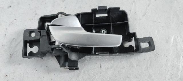 Maçaneta interna dianteira/traseira da porta esquerda 7S71A22601AB FORD