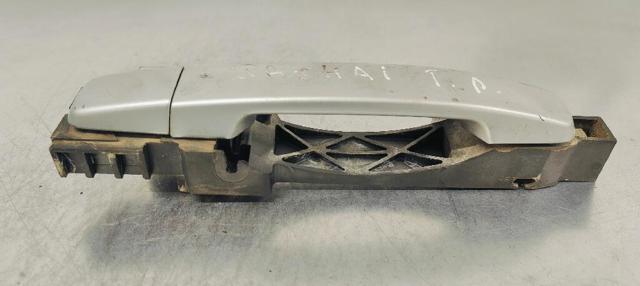 Suporte de maçaneta externa da porta dianteira direita 80610EB300 NISSAN