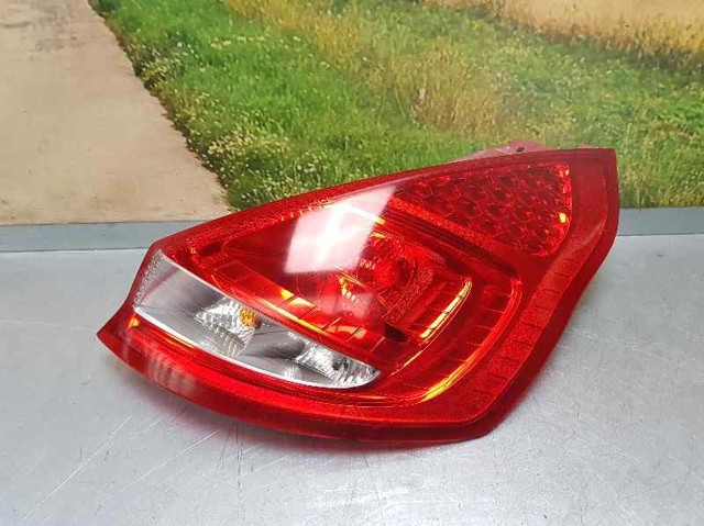Lanterna traseira direita 8A6113404AE FORD