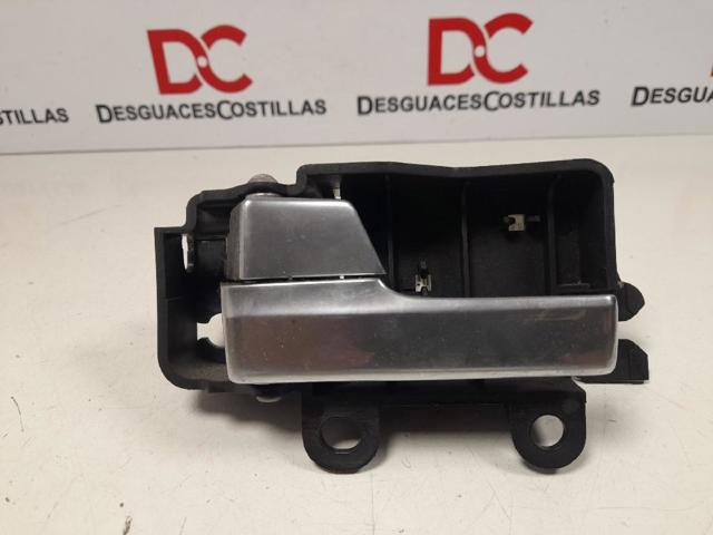 Maçaneta interna esquerda da porta dianteira 8M51R22601AA FORD