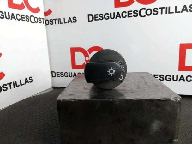 Comutador das luzes no "painel de instrumentos" 90340746 OPEL
