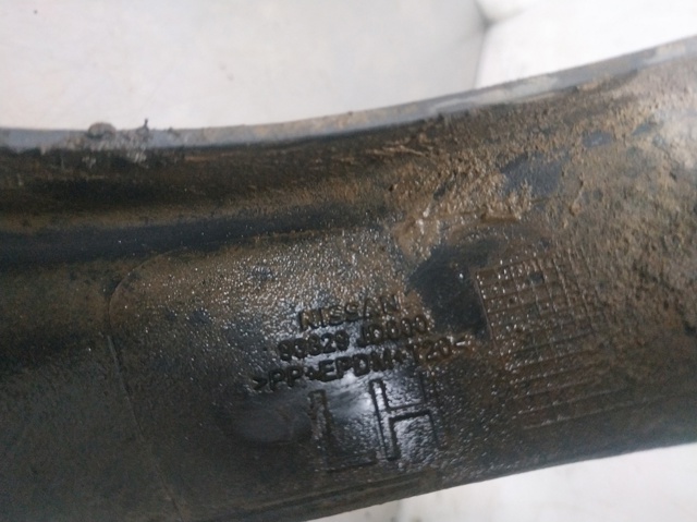 Expansor esquerdo (placa sobreposta) de arco do pára-lama traseiro 93829JD000 NISSAN
