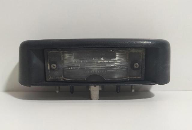 Lanterna da luz de fundo de matrícula traseira 93854773 OPEL