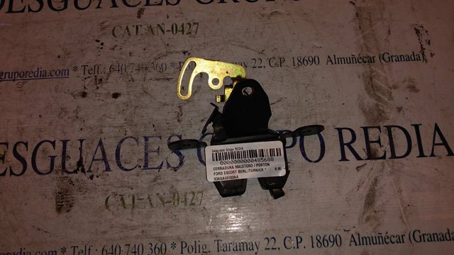 Fecho de tampa de porta-malas (de 3ª/5ª porta traseira) 93AGA43102AA FORD