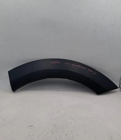 Expansor esquerdo (placa sobreposta) de arco do pára-lama traseiro 9800769 BMW