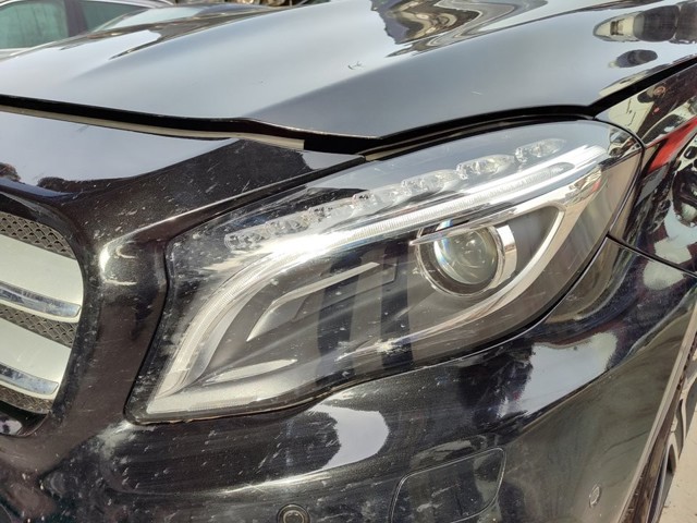 Luz esquerda A1569063100 MERCEDES