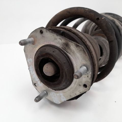 Amortecedor dianteiro esquerdo DF7134900F MAZDA