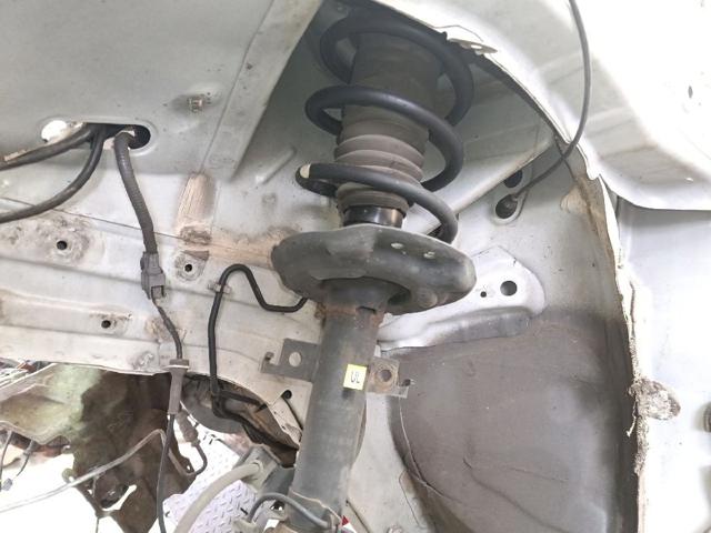 Amortecedor dianteiro esquerdo E43034CB1E NISSAN