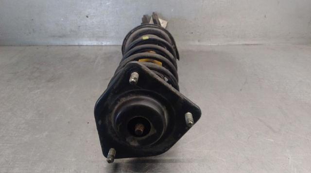 Amortecedor dianteiro esquerdo MR594023 MITSUBISHI