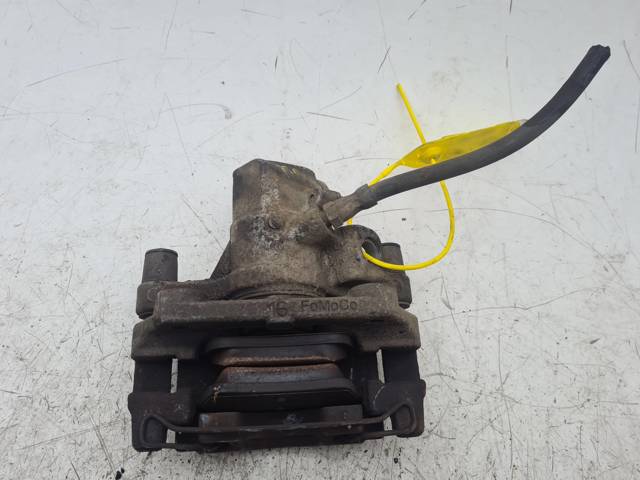 Suporte do freio traseiro direito R98AX2552AA FORD