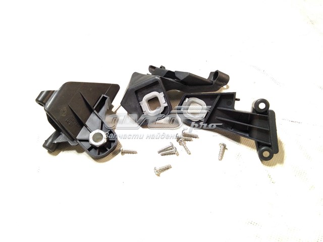 Consola (adaptador) de fixação da luz dianteira esquerda Fiat/Alfa/Lancia 51877428 preço, a partir de 50,40 USD