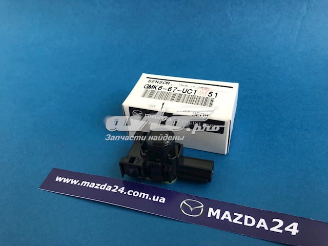 Sensor traseiro de sinalização de estacionamento (sensor de estacionamento) Mazda GMK667UC151